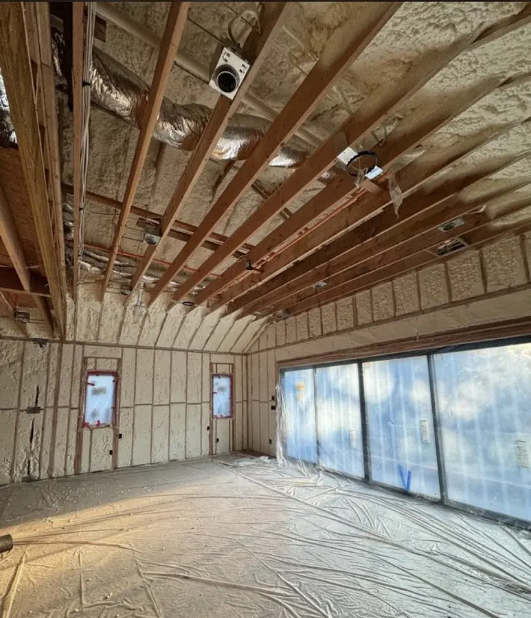 Interior walls and ceiling insulated with spray foam during new construction in West Rockhill